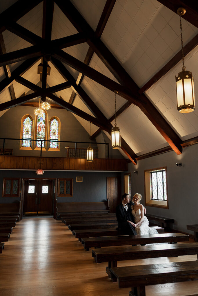 A couple sitting together in their empty ceremony space before their wedding at The Leona in St. Louis, Missouri.