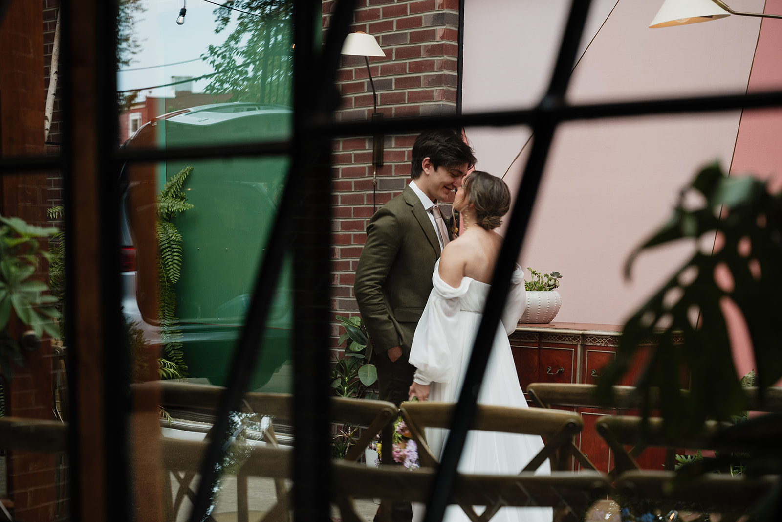 A couple sharing a quiet moment alone in their ceremony space before their wedding at Verde on Cherokee in St. Louis, Missouri.